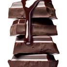 Close,Up,Of,Chocolate,Pieces,Stack,And,Chocolate,Syrup,On